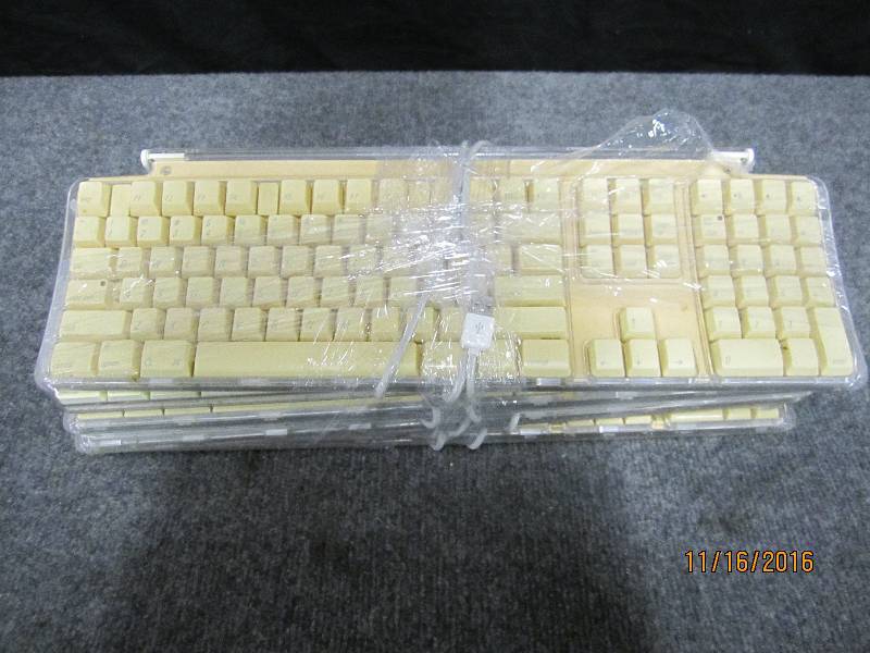 lot 157 image: Lot of 4 Apple keyboards...