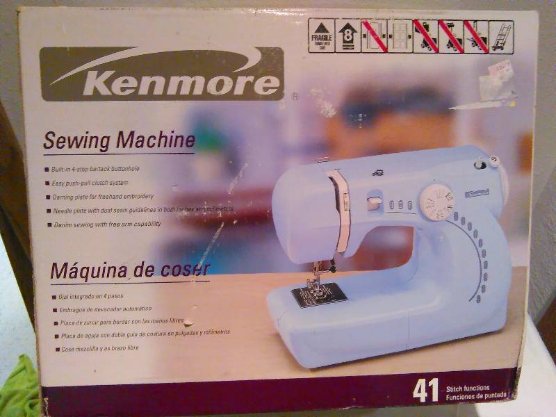 lot 23 image: Kenmore Sewing Machine, new, never used, 41 stich functions