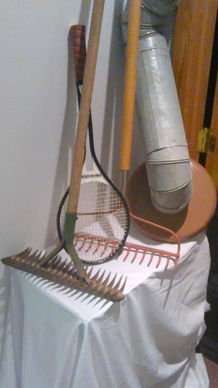 lot 91 image: Rake (2), Tennis Racket, and stove  exhaust pipe