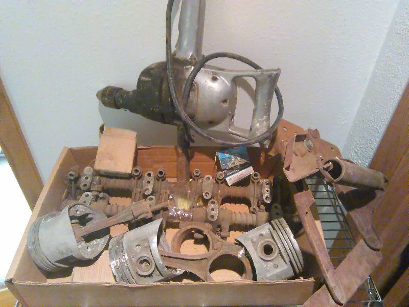 lot 123 image: Bucket of Lag Bolts and screws, pistons, Vintage Electric Drill and more