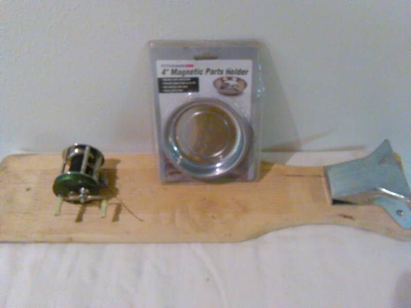 lot 206 image: Vintage Shakespeare Reel (Acme1901), Fish cleaning board, magnetic hook holder