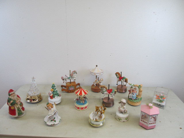 lot 25 image: Large Lot of Musical Carousels Music Boxes