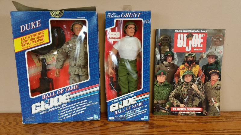 lot 48 image: (2) GI Joe 12 Figures in Box  GI Joe Collectors Guide