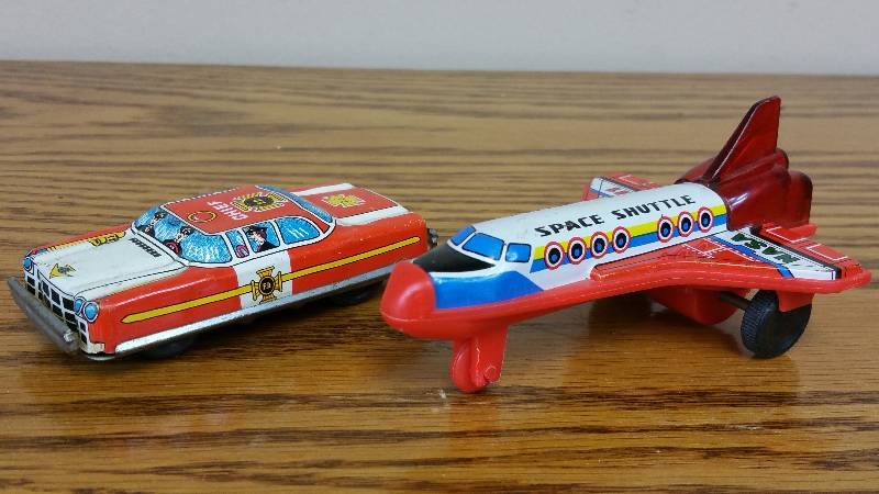 lot 68 image: (2) Japan Tin Litho Frictions Toys