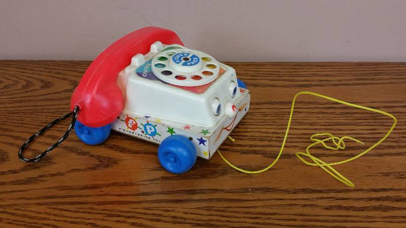 lot 69 image: 1961 Fisher Price Telephone Pull Toy #747