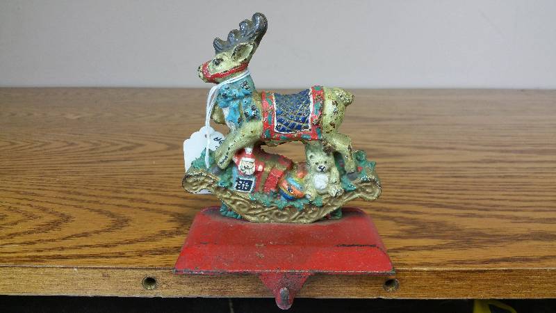 lot 77 image: Antique Cast Iron Christmas Stocking Holder