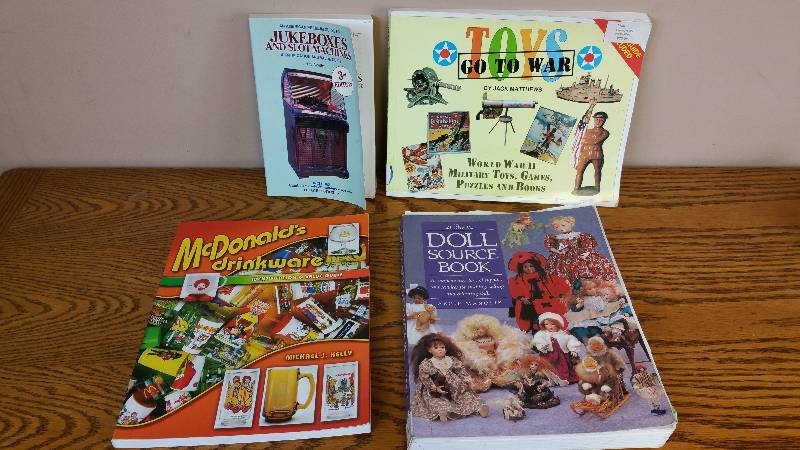 lot 90 image: Group of 4 Price Guides  Source Books