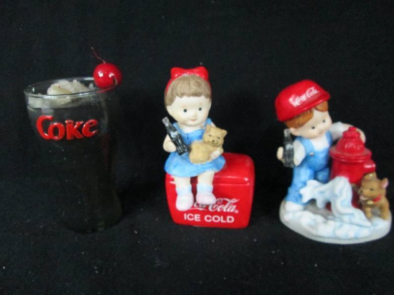lot 62 image: Enesco Coca Cola Figures