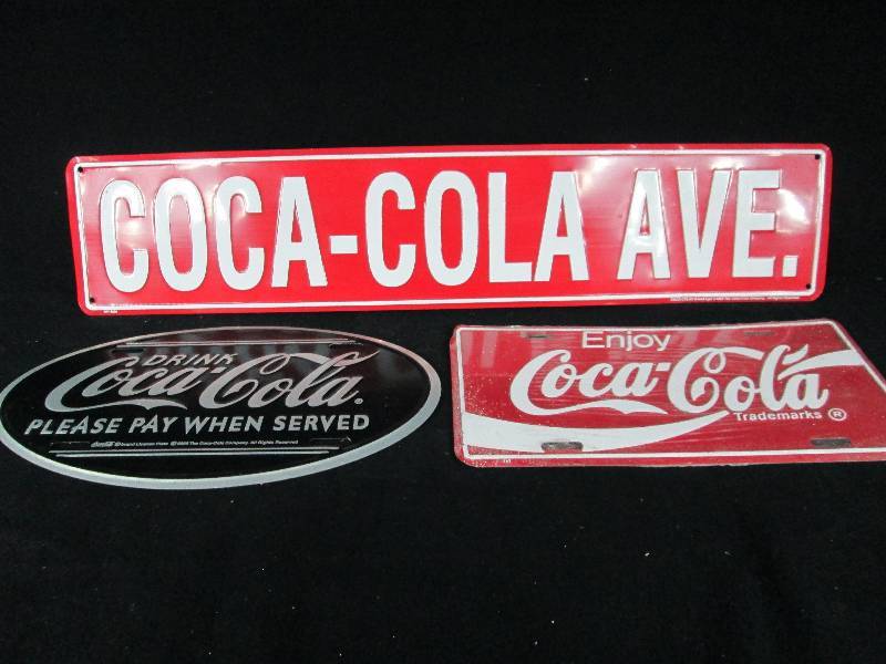 lot 77 image: Collectable Tin Coca Cola License Plates