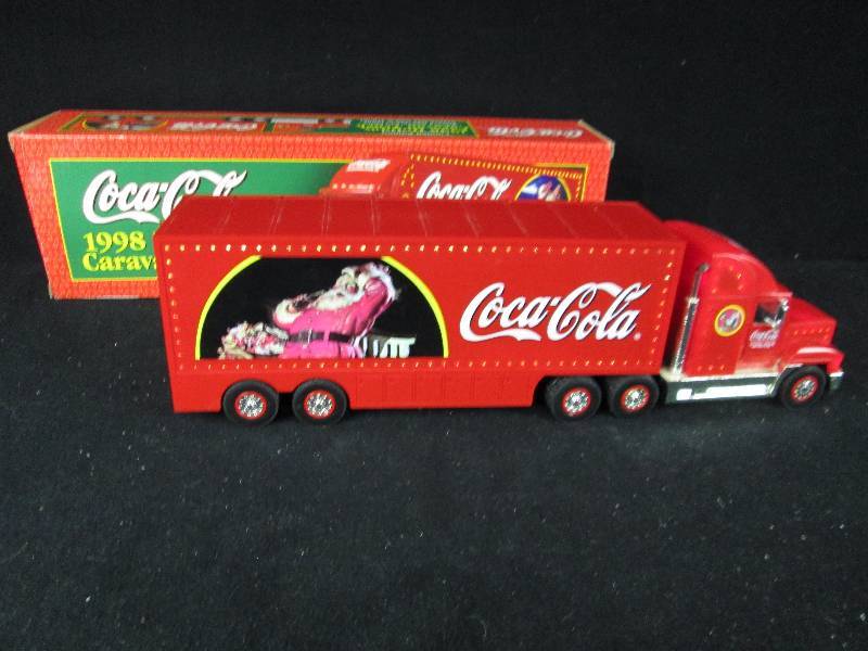 lot 83 image: Collectable Coca Cola Trucks