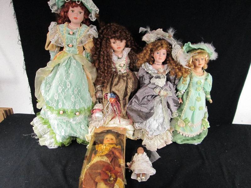 lot 211 image: Porcelain Dolls