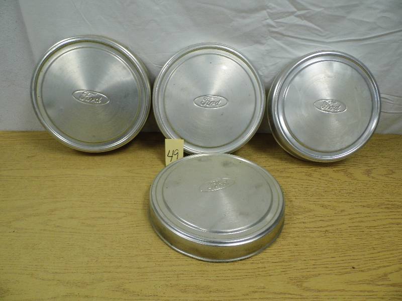 4 Vintage Ford Hubcaps
