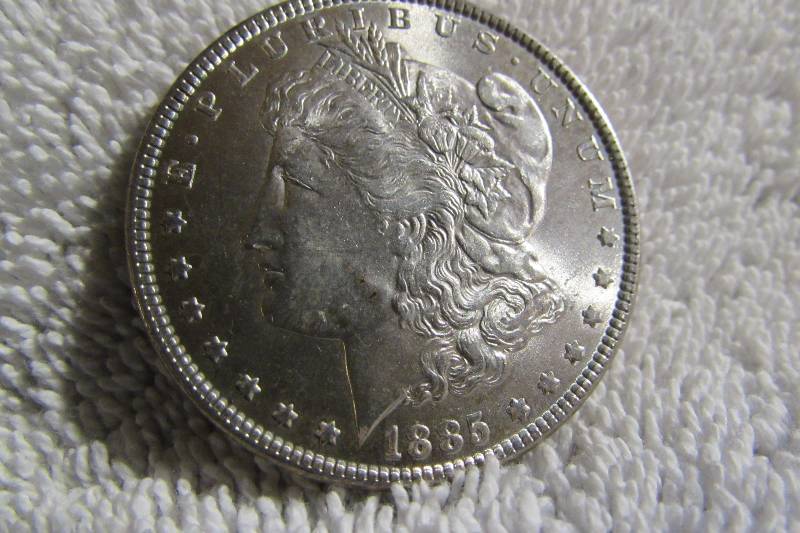 1885 MORGAN SILVER DOLLAR, 90% SILVER