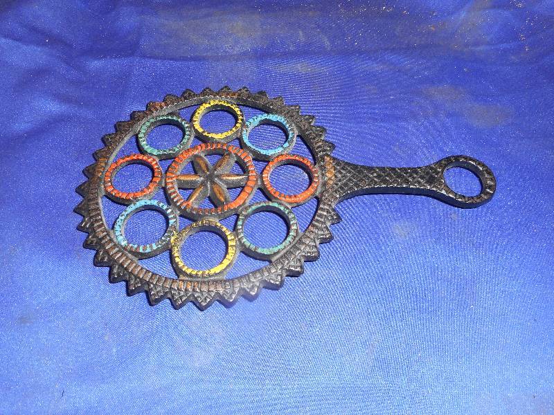 VINTAGE CAST IRON TRIVET