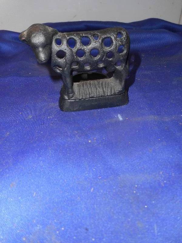 CAST IRON COW CANDLE HOLDER