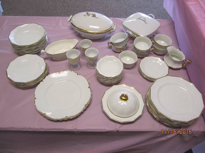 Dish ware set, rimmed in gold...