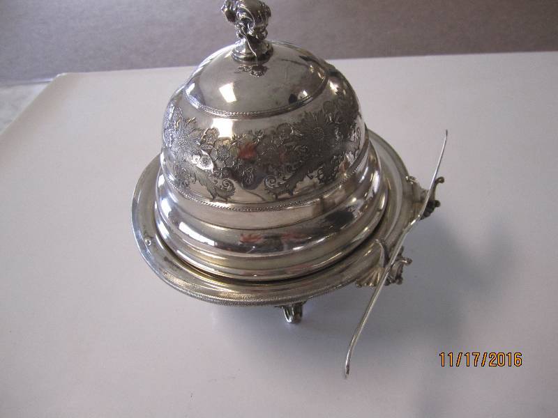Covered butter dish with knife and ...
