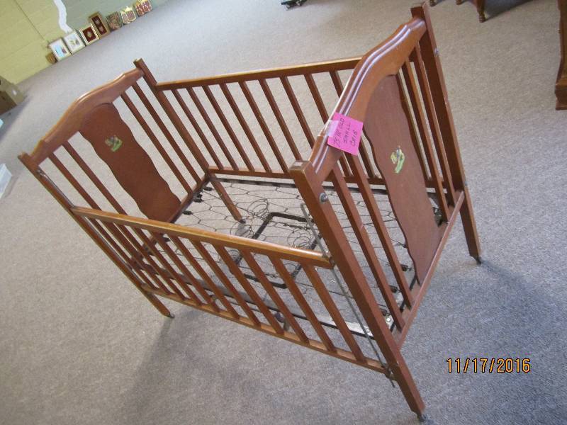 Wood crib, atr least 75 years old...