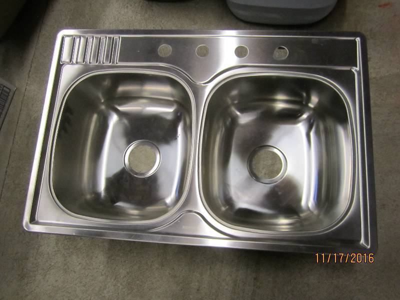 New stainless steel sink, outer edg...
