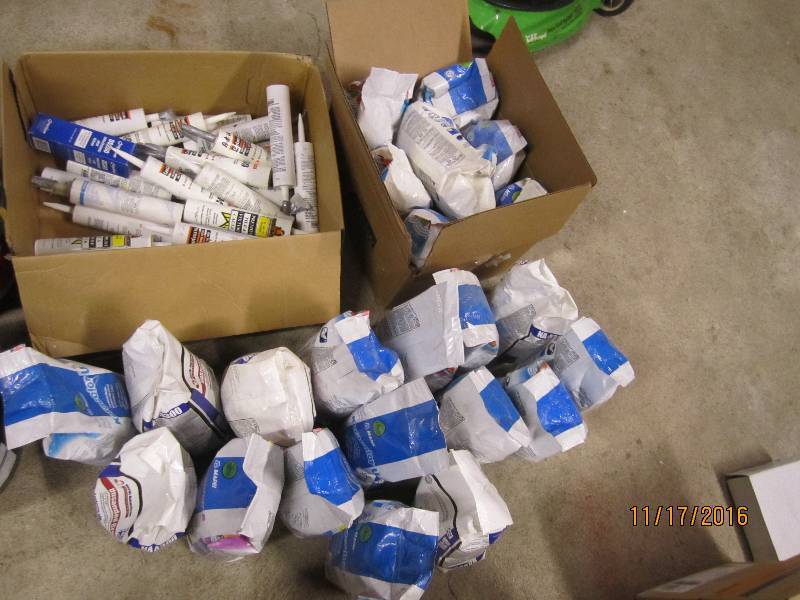 Large lot of tile grout and caulkin...