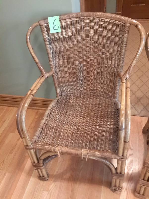 2 Rattan Chairs.. Some damage on part as shown..