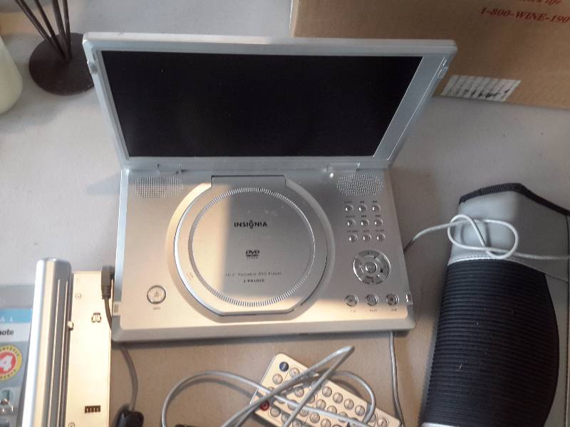 Insignia DVD Player, Case, Battery.. Universal Remote Control Laurel and Hardy DVD