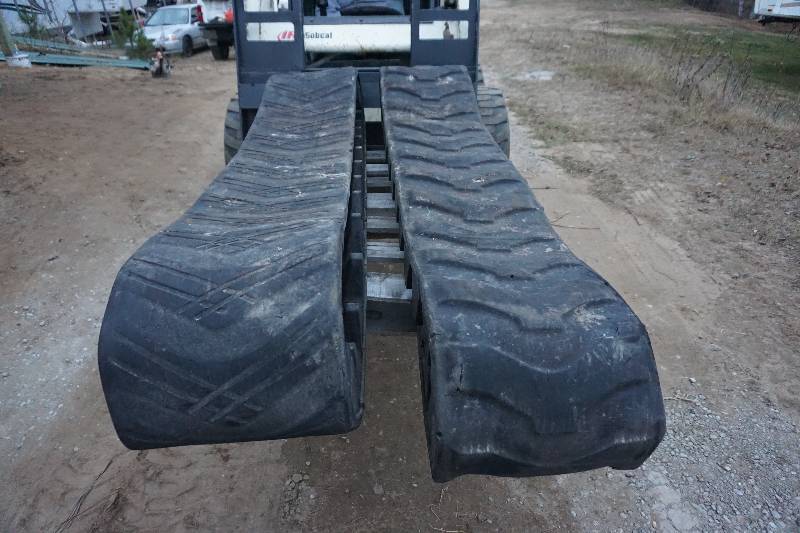 lot 13 image: Set of Over The Tire Bobcat Skid Loader Skid Steer Rubber Tracks