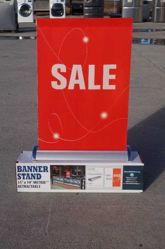 lot 17 image: Small Retractable Sale Banner Stand
