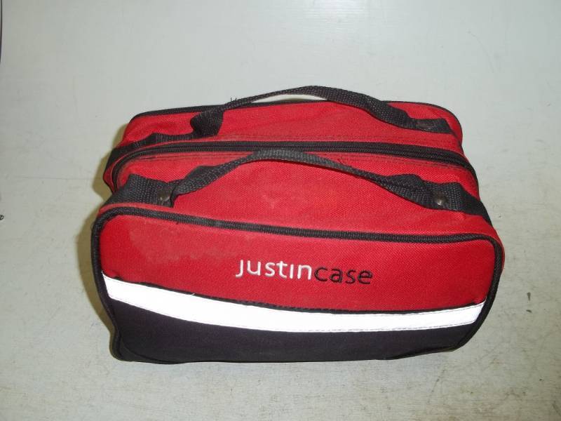 Justin  Case bag includes jumper cables, tire repair, flashlight, ext�