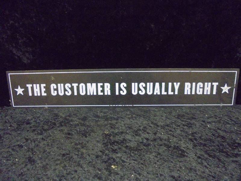 lot 86 image: Jimmy Johns Customer Usually Right, 2002, Plastic, 23x4
