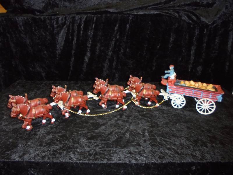 lot 38 image: Cast Clydesdale Beer Wagon, one man needs to be rewelded