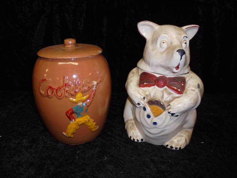 lot 39 image: Pair Cookie Jars -McCoy Dog, Cowboy (has cracked lid)