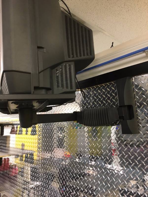 lot 33 image: 19 Sony TV w Swing Arm Mounting Bracket & Remote