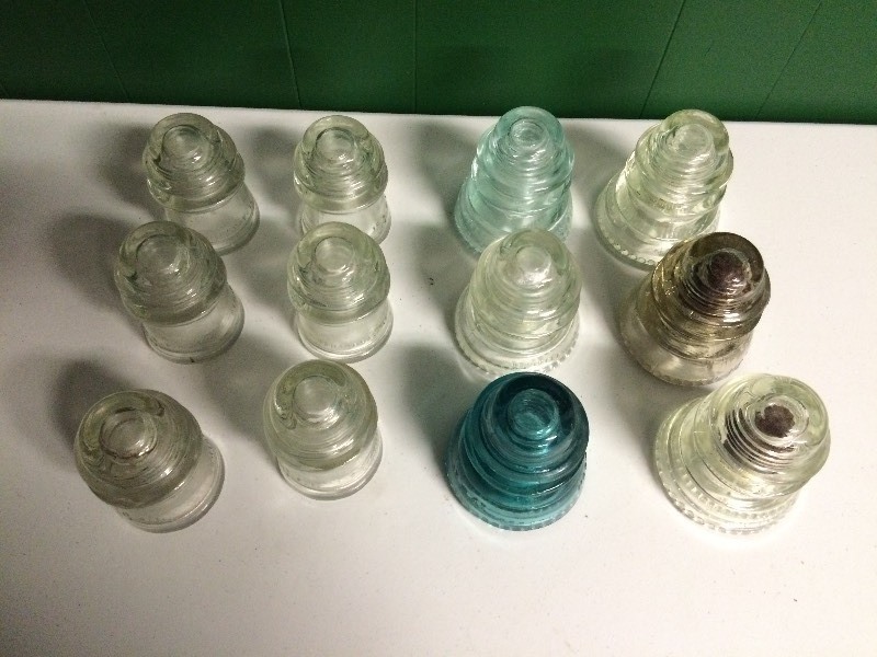lot 54 image: 12 ELECTRIC INSULATORS