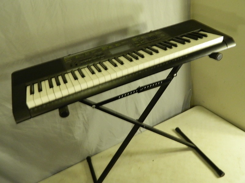 lot 88 image: Casio Keyboard with Stand