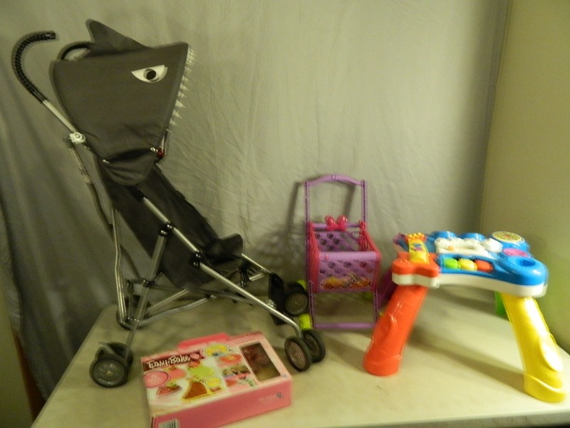 lot 108 image: Shark Stroller, Activity Table, and More