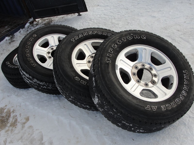 lot 2 image: Firestone Transforce AT Tires  with 8-bolt Ford Wheels