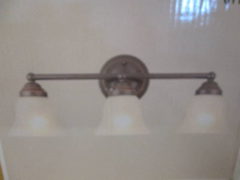 lot 105 image: Hampton Bay ashhurst 3-light vanity...
