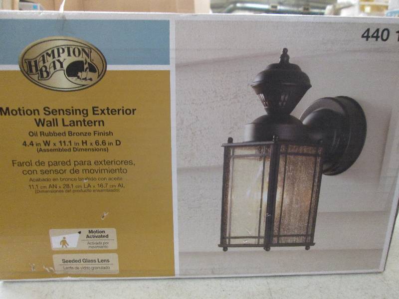 lot 303 image: Hampton Bay motion sensing exterior...