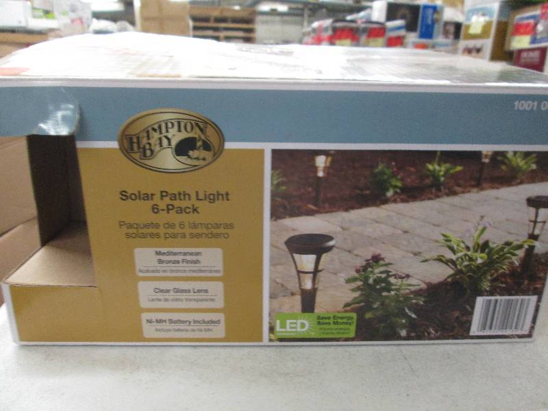 lot 329 image: Hampton Bay 4-pack of solar LED lig...