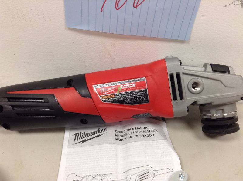 lot 166 image: Milwaukee 5in. Grinder  13 Amp, Paddle Grip, Lock-On Slide Switch, Clutch, Model# 6117-33