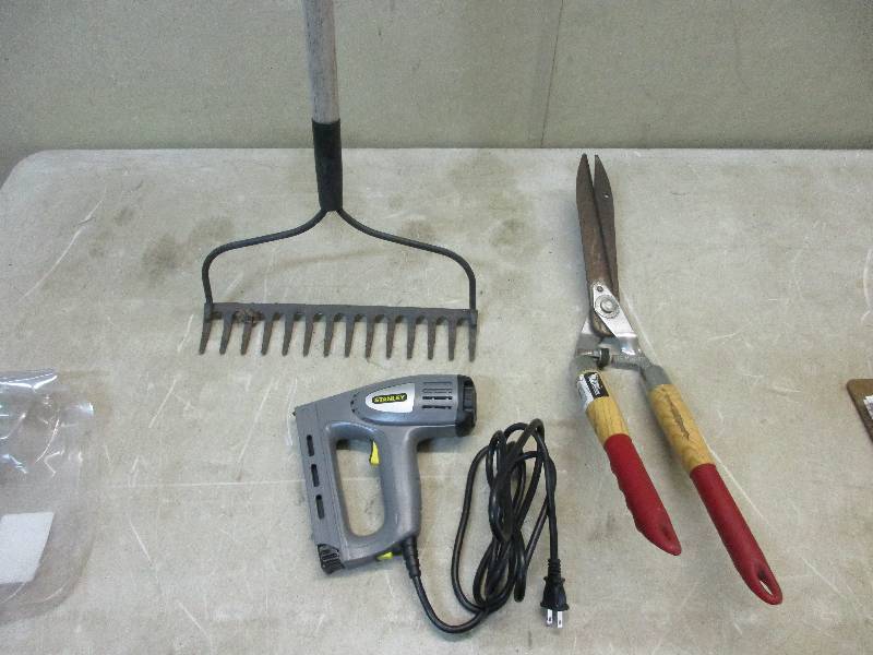 lot 14 image: Stanley staple gun rake trimmer small red tool pouch (not pictured)