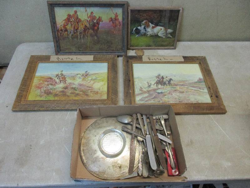 lot 22 image: box of silverware and 4 art pieces