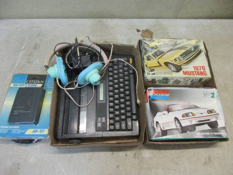 lot 24 image: 2 ford mustang models typewriter cassette recorder