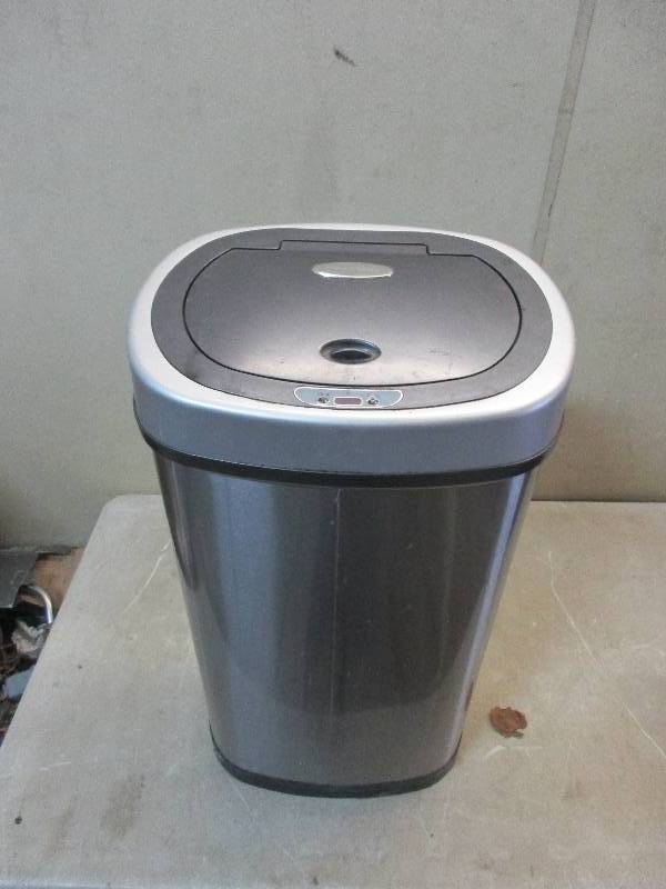 lot 50 image: motion censored trash can
