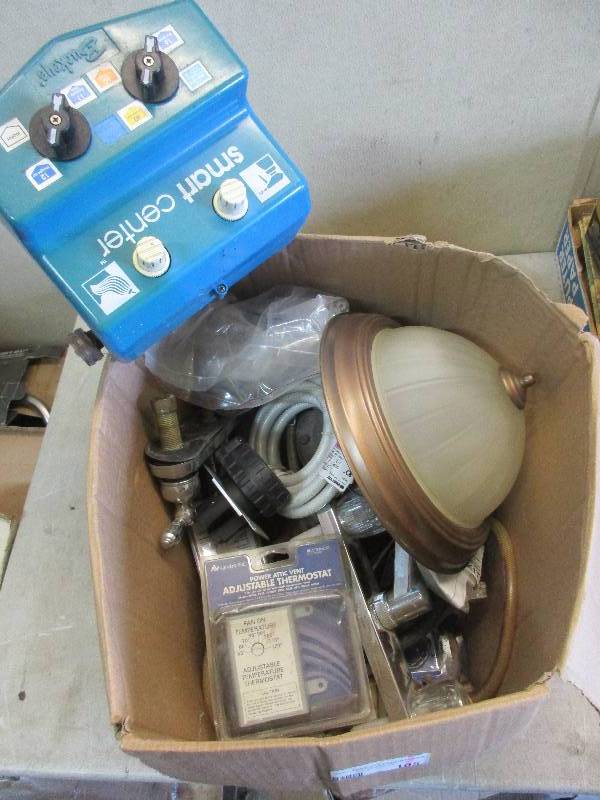 lot 105 image: misc plumbing and electrical stuff and cigarette roller