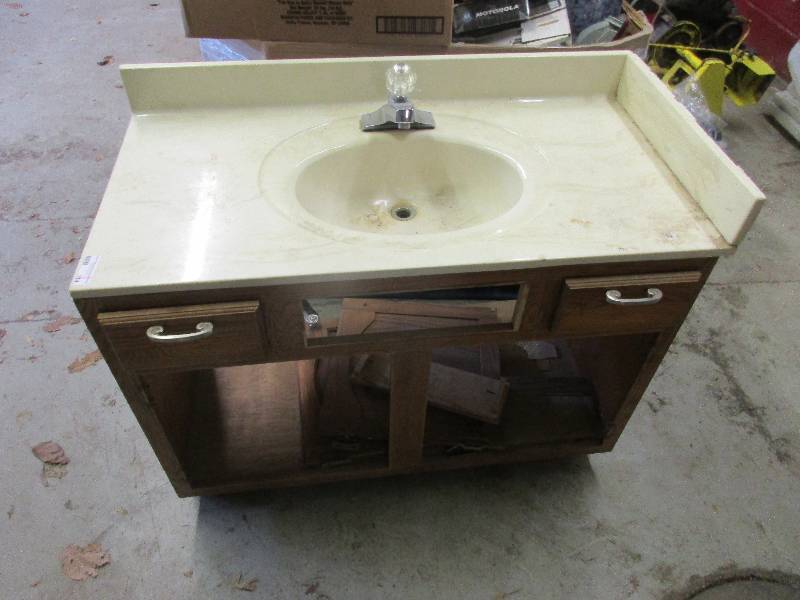lot 114 image: bathroom sink and cabinet