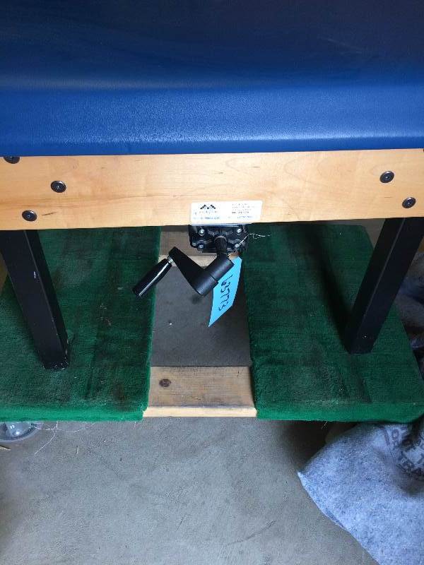 lot 11 image: Med Mart 11006-SPC Hi  Low Treatment Table - Excellent Condition - Dollies Not Included