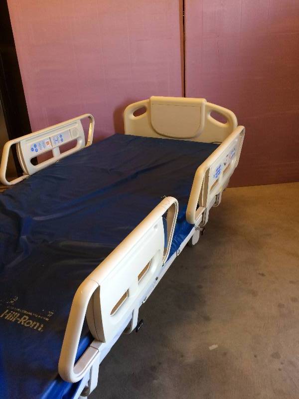lot 49 image: WOW Retails Used $2,460 Hill-Rom Advanta P1600 Adjustable Patient Bed w Wheels - Excellent Condition - WhiteBlue