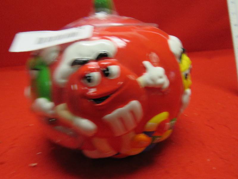 lot 24 image: M&M Collectible Jar